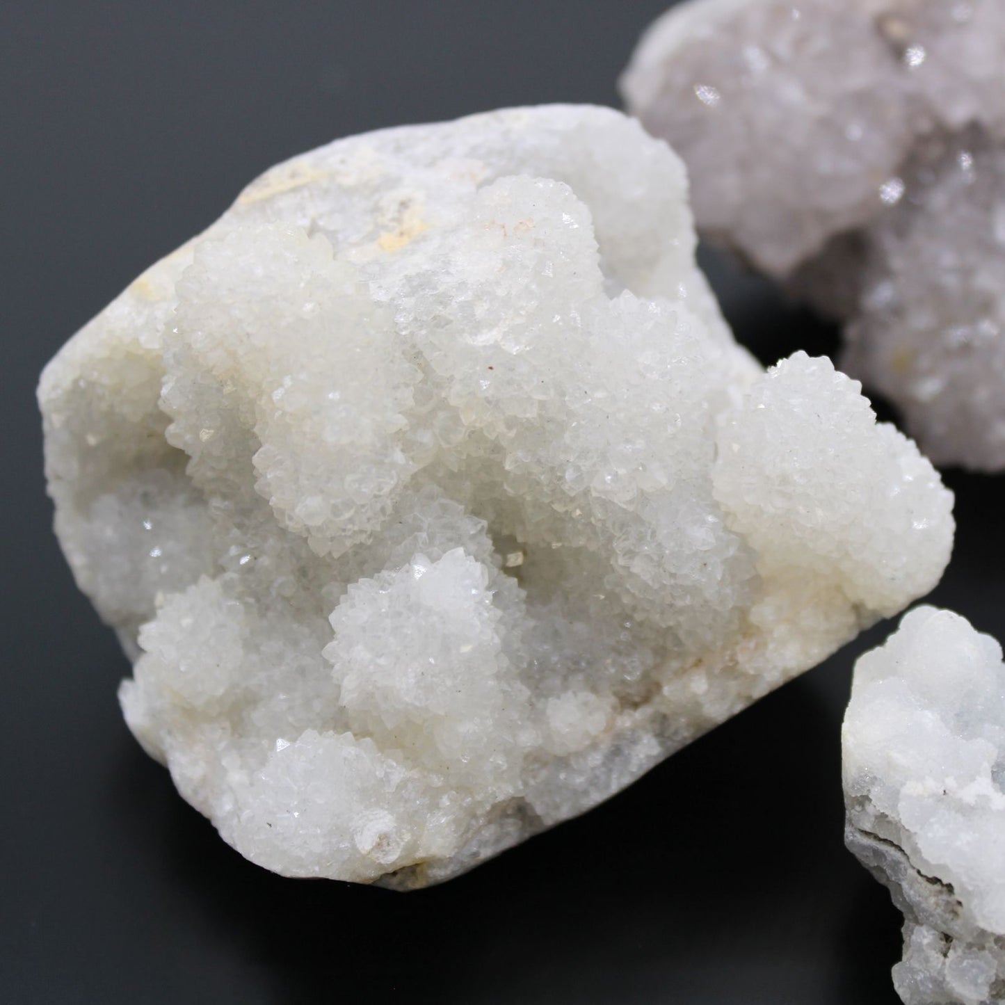 Close-up of a crystal formation on a dark background