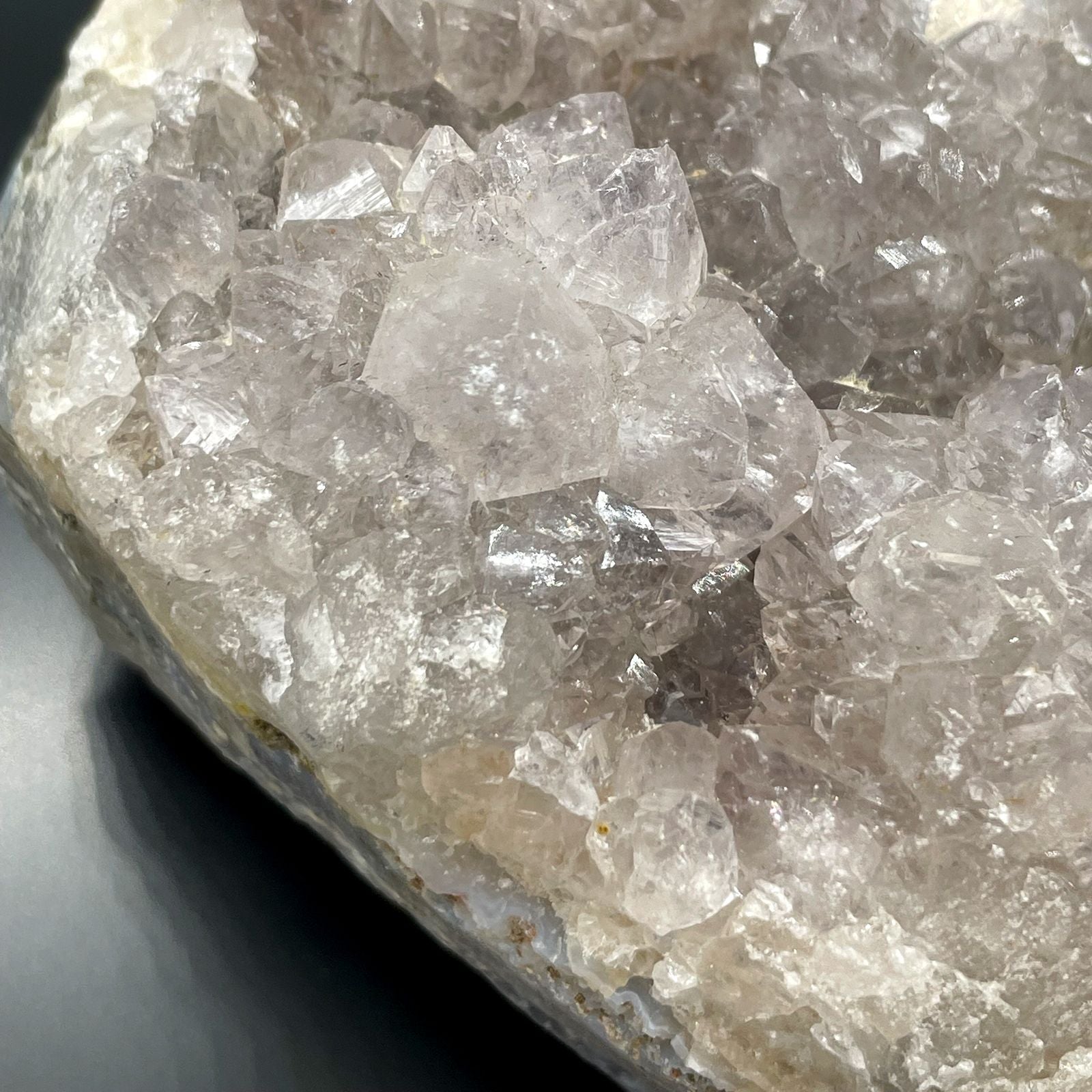 Close-up of crystal formations on a dark background