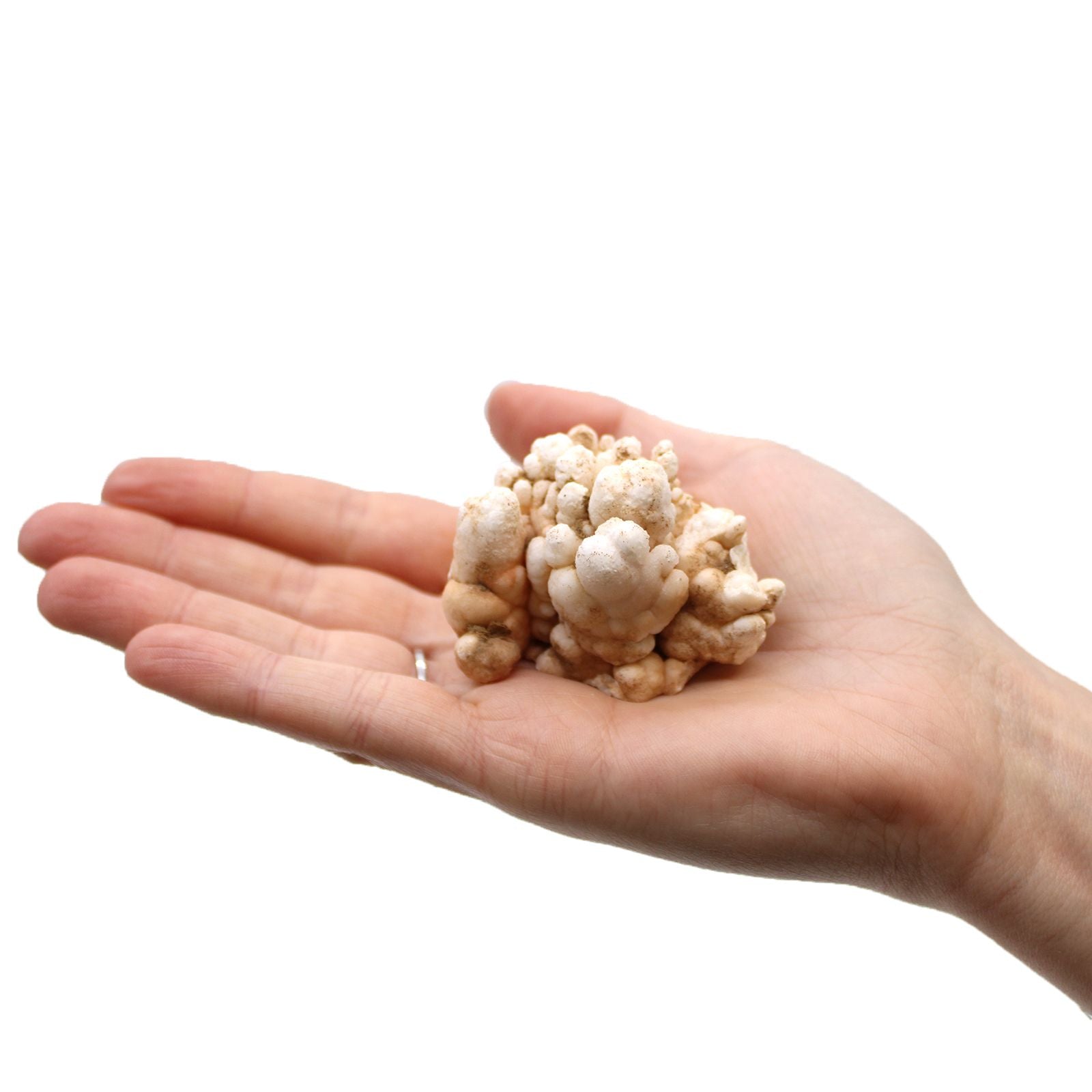 Natural crystal mineral specimen held in hand
