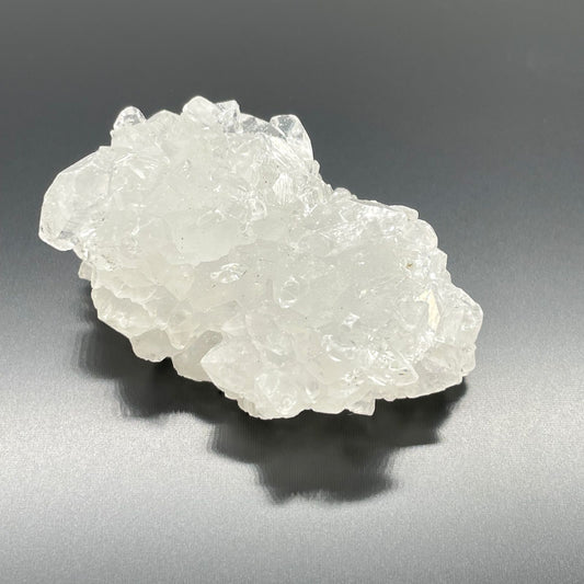 Crystal rock on a gray background