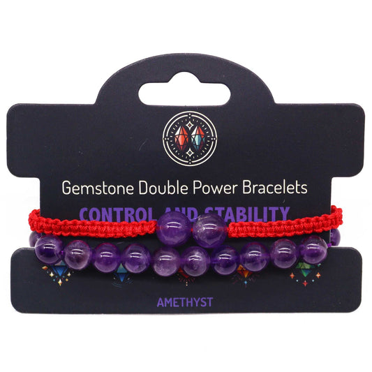 Pair of gemstone double power bracelets on a black card with text and brand logo.